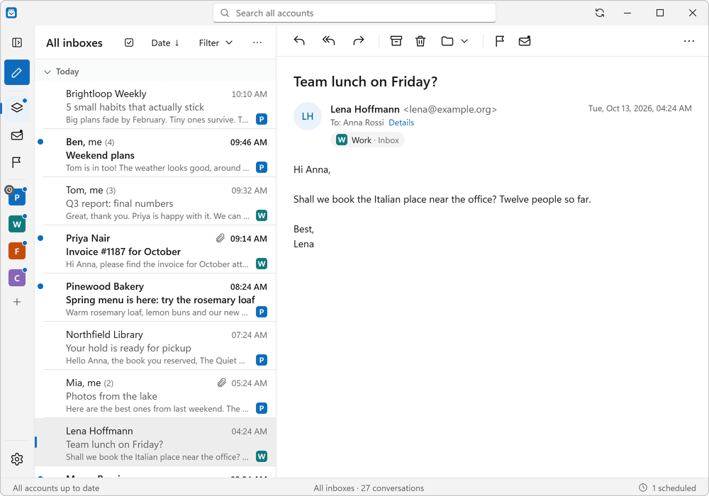 Message list mixing mail from a personal and a work account, each with a colored badge.